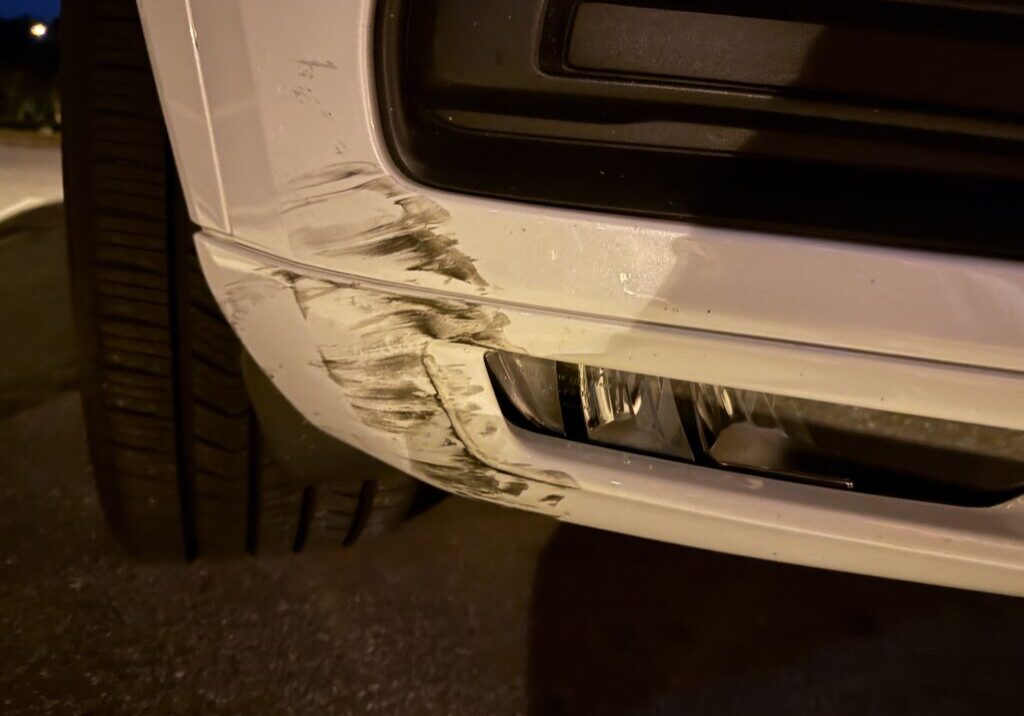 Car Hit by Road Debris